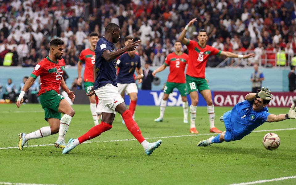 Randal Kolo Muani of France scores the team's second goal during the FIFA World Cup Qatar 2022 semi final - Julian Finney/Getty Images