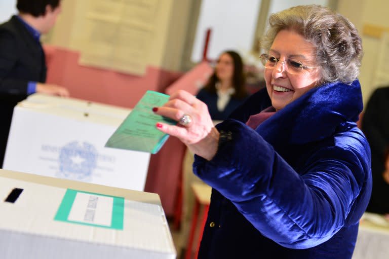 Elsa, wife of Italy's outgoing Prime Minister Mario Monti, casts her ballot in a polling station on February 24, 2013 in Milan. Polls reopened in Italy on Monday for a second and final day of voting in a critical election for the future of the eurozone in which the centre-left Democratic Party is expected to win but fall short of a governing majority