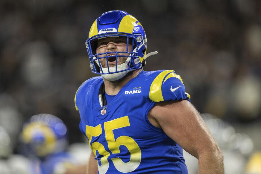 Los Angeles Rams center Brian Allen (55) reacts after the team scored.
