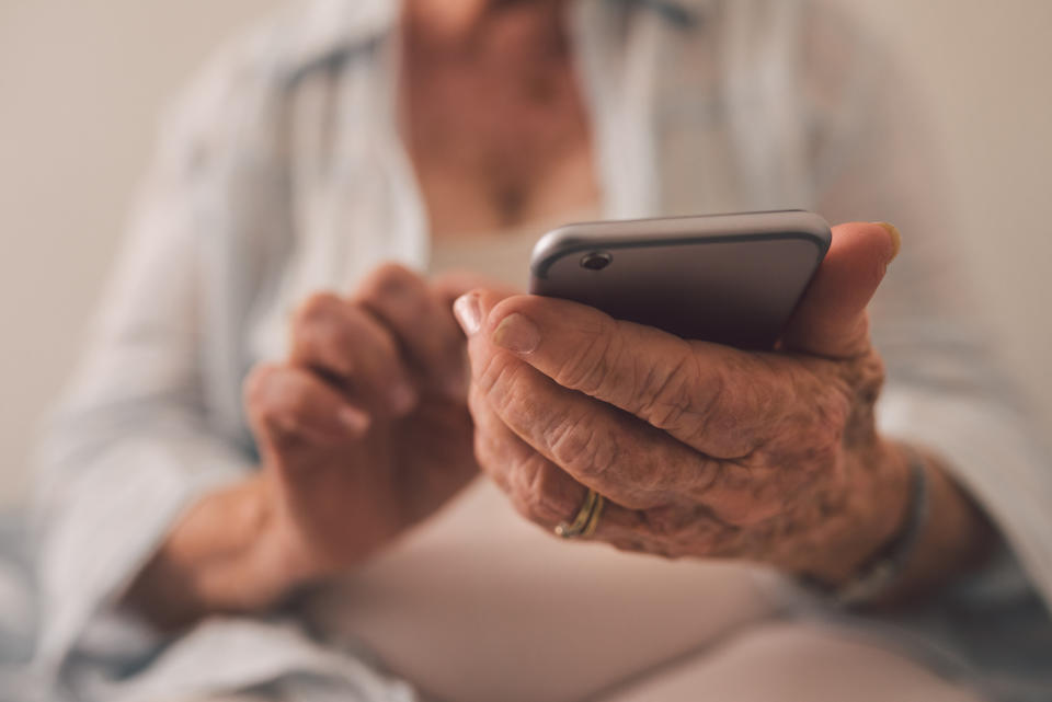 hands holding a phone