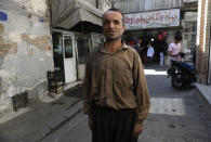 Loqman Karimi, a 50-year-old porter who pushes laden carts through the narrow alleys of Tehran’s Grand Bazaar, speaks with The Associated Press about the upcoming presidential election, in Tehran, Iran, Thursday, June 10, 2021. Karimi said he’ll support Ebrahim Raisi, the country’s hard-line judiciary chief who’s closely aligned with Supreme Leader Ayatollah Ali Khamenei, not for his airy promises but for concrete things he’d already done as judiciary chief. (AP Photo/Vahid Salemi)