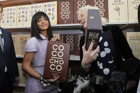 Singer Rihanna (L) poses with photographer Ellen von Unwerth after the German designer Karl Lagerfeld Fall/Winter 2014-2015 women's ready-to-wear collection show for French fashion house Chanel during Paris Fashion Week March 4, 2014. REUTERS/Stephane Mahe