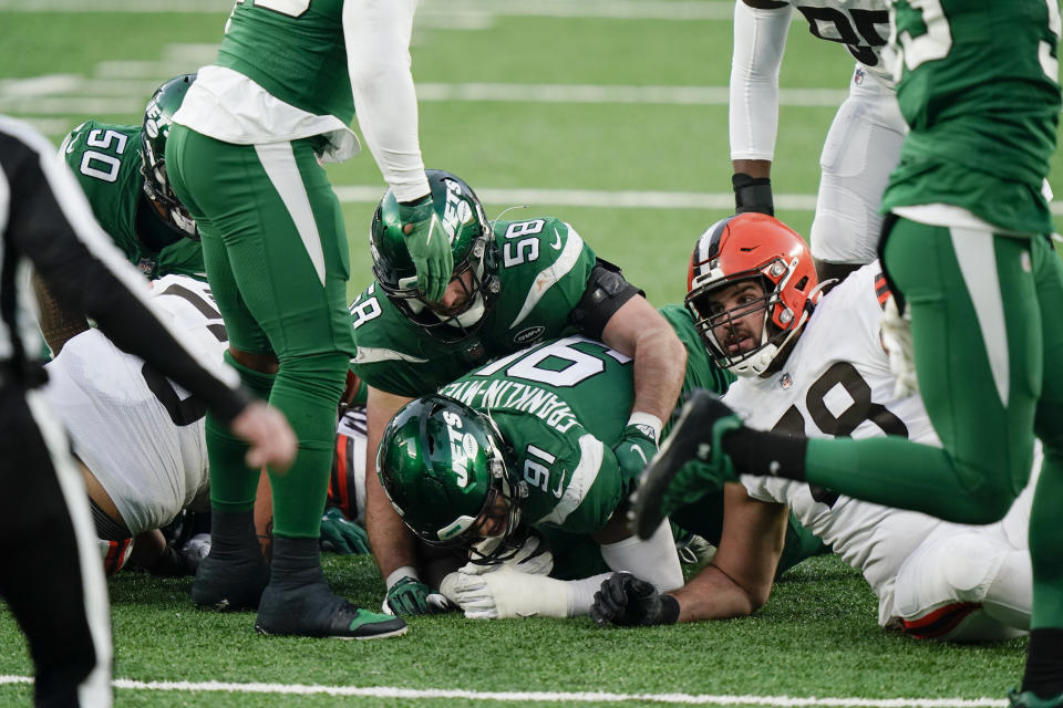 Cleveland Browns offensive tackle Jack Conklin (78) reacts as New York Jets defensive end John Franklin-Myers (91) recovers a fumble during the second half of an NFL football game Sunday, Dec. 27, 2020, in East Rutherford, N.J. (AP Photo/Corey Sipkin)