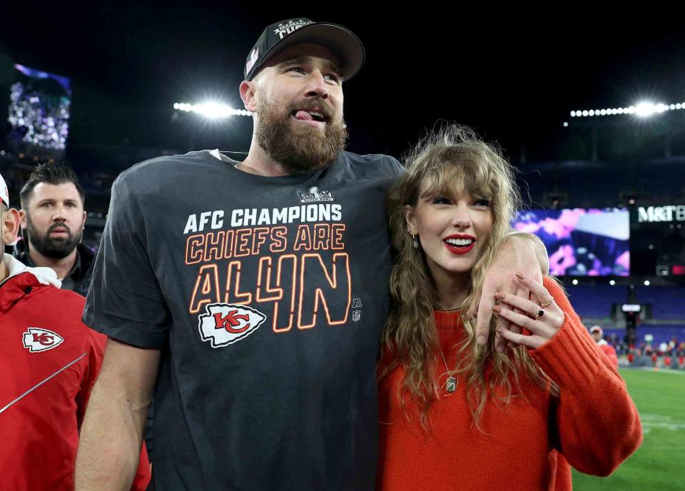 <p>Rob Carr/Getty</p> Travis Kelce and Taylor Swift in Baltimore in January 2024