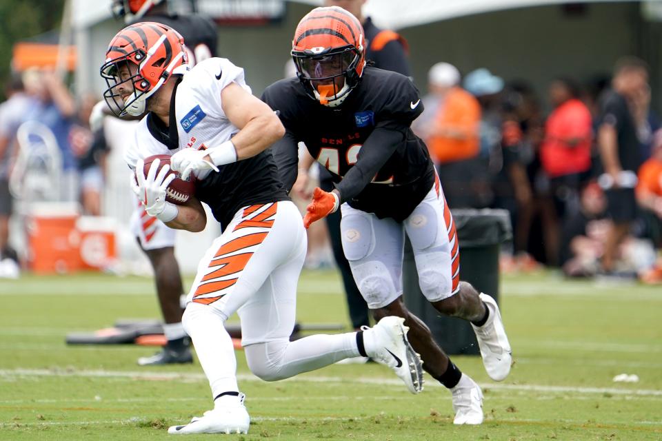 Cincinnati Bengals cornerback Allan George (42) defends on Cincinnati Bengals wide receiver Trent Taylor (11) during Cincinnati Bengals training camp practice, Thursday, Aug. 4, 2022, at the Paul Brown Stadium practice fields in Cincinnati. 