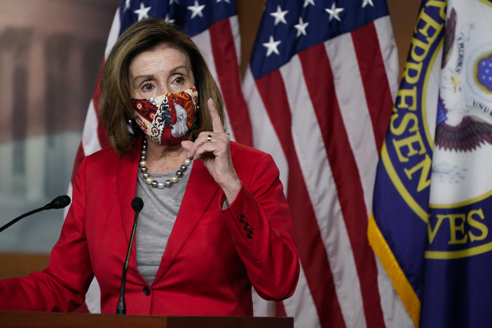 House Speaker Nancy Pelosi of Calif., speaks to the media, Wednesday Dec. 30, 2020, on Capitol Hill in Washington. (AP Photo/Jacquelyn Martin)