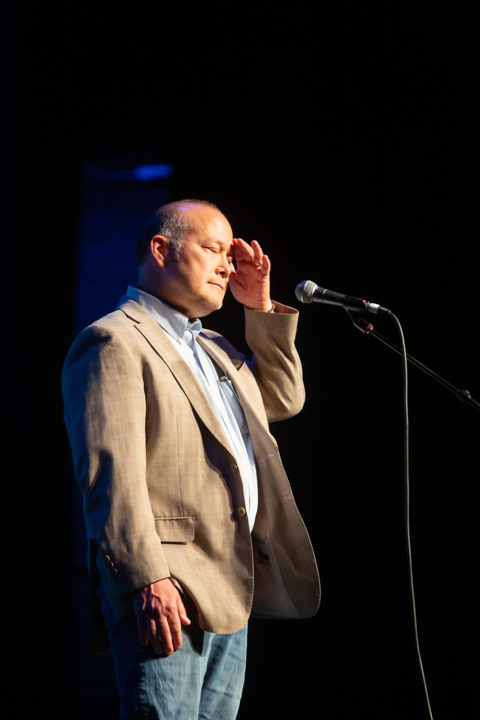 Jim Ramm performs at the "Growing Up" themed Storytellers event at Hoyt Sherman Place in Des Moines, Tuesday, April 26, 2022.