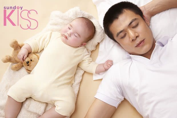 Father and baby (3-6 months) sleeping side-by-side