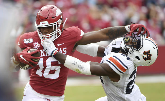 NFL draft: Arkansas' Treylon Burks has giant hands, hunts hogs with knives,  could be WR1