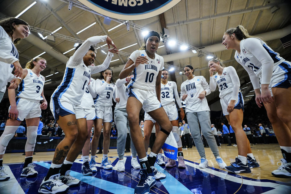 Villanova's Christina Dalce (10) and teammates celebrate after winning a second-round college basketball game against Florida Gulf Coast in the NCAA Tournament, Monday, March 20, 2023, in Villanova, Pa. (AP Photo/Matt Rourke)