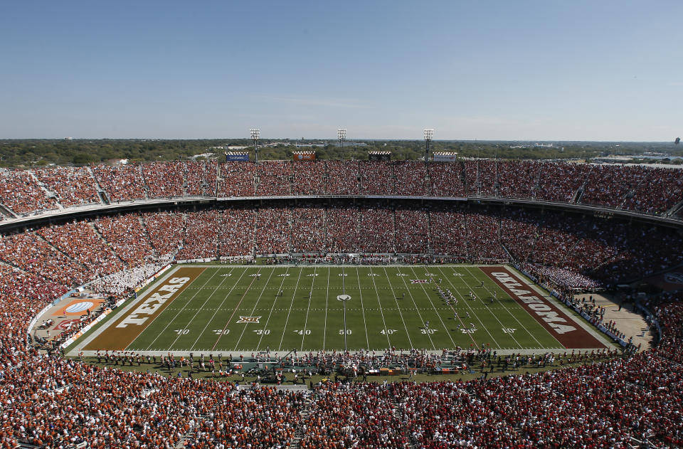 In this general overall view of the Cotton Bowl stadium, fans watch as Oklahoma and Texas play during an NCAA college football game Saturday, Oct. 10, 2015, in Dallas. (AP Photo/Tony Gutierrez)