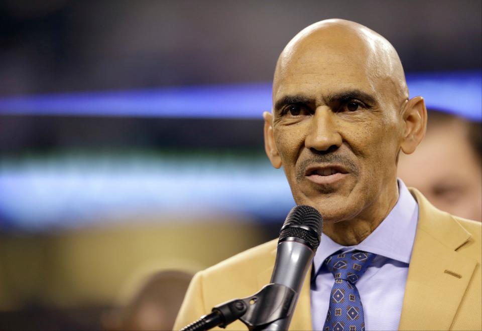 FILE - Former Indianapolis Colts' head coach Tony Dungy is honored during halftime of an NFL football game between the Colts and the Pittsburgh Steelers  on Thursday, Nov. 24, 2016, in Indianapolis. The Indianapolis Colts have established the Tony Dungy Diversity Fellowship to advance the opportunities for football coaching candidates. The program in honor of the Pro Football Hall of Fame coach, announced Monday, March 7, 2022, by the Irsay family that owns the Colts, will provide the team with access to talented coaches while fostering and expanding the team's diversity, equity and inclusion initiatives.  (AP Photo/Michael Conroy, Filee)