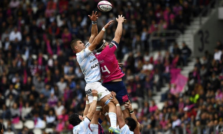 Stade Francais Paris' lock Paul Gabrillagues (R) and Racing 92's lock Gerbrandt Grobler go for the ball in a line-out on April 30, 2017