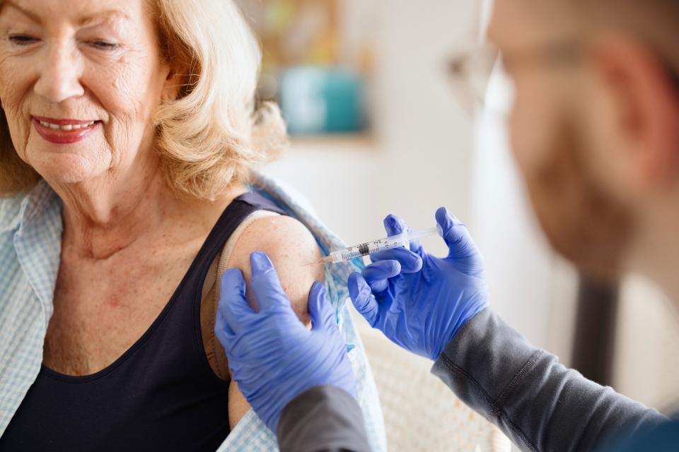 Close-up of a woman getting Pneumonia vaccine