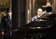 Former Nissan Chairman Carlos Ghosn leaves the Tokyo Detention Center, in Tokyo Thursday, April 25, 2019. Ghosn walked out of detention Thursday evening, his head held high, after a Japanese court rejected an appeal from prosecutors and his 500 million yen ($4.5 million) in bail was paid earlier in the day. (AP Photo/Eugene Hoshiko)