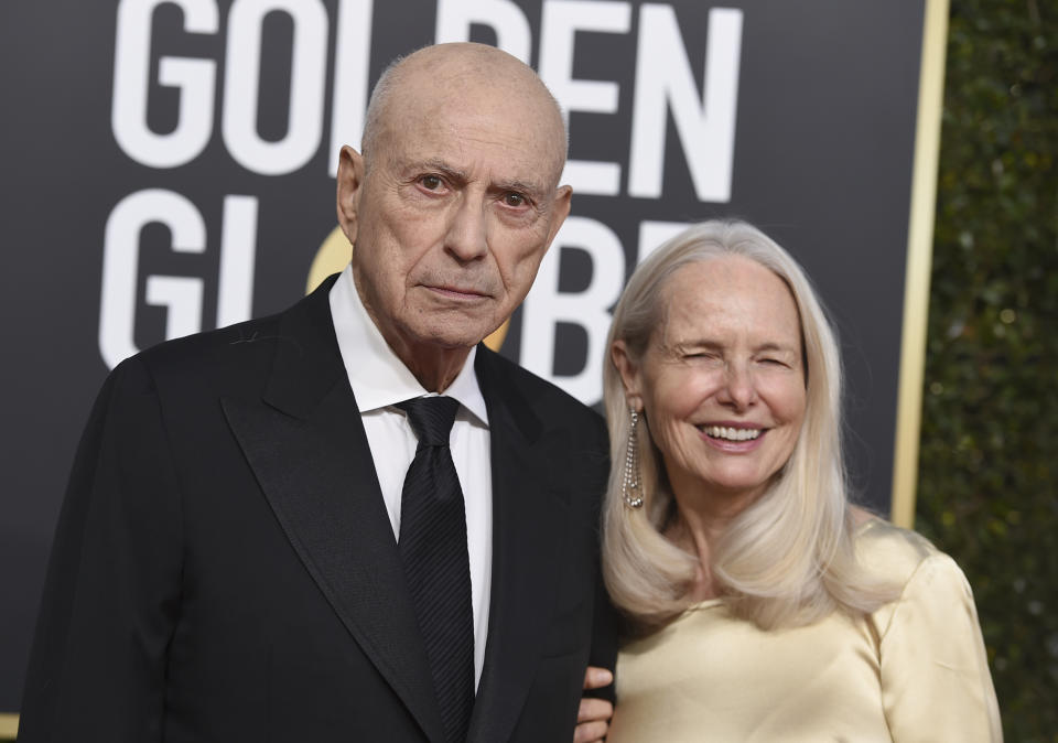 FILE - Alan Arkin, left, and Suzanne Newlander Arkin arrive at the 76th annual Golden Globe Awards on Jan. 6, 2019, in Beverly Hills, Calif. Arkin, the wry character actor who demonstrated his versatility in comedy and drama as he received four Academy Award nominations and won an Oscar in 2007 for "Little Miss Sunshine," has died. He was 89. (Photo by Jordan Strauss/Invision/AP)