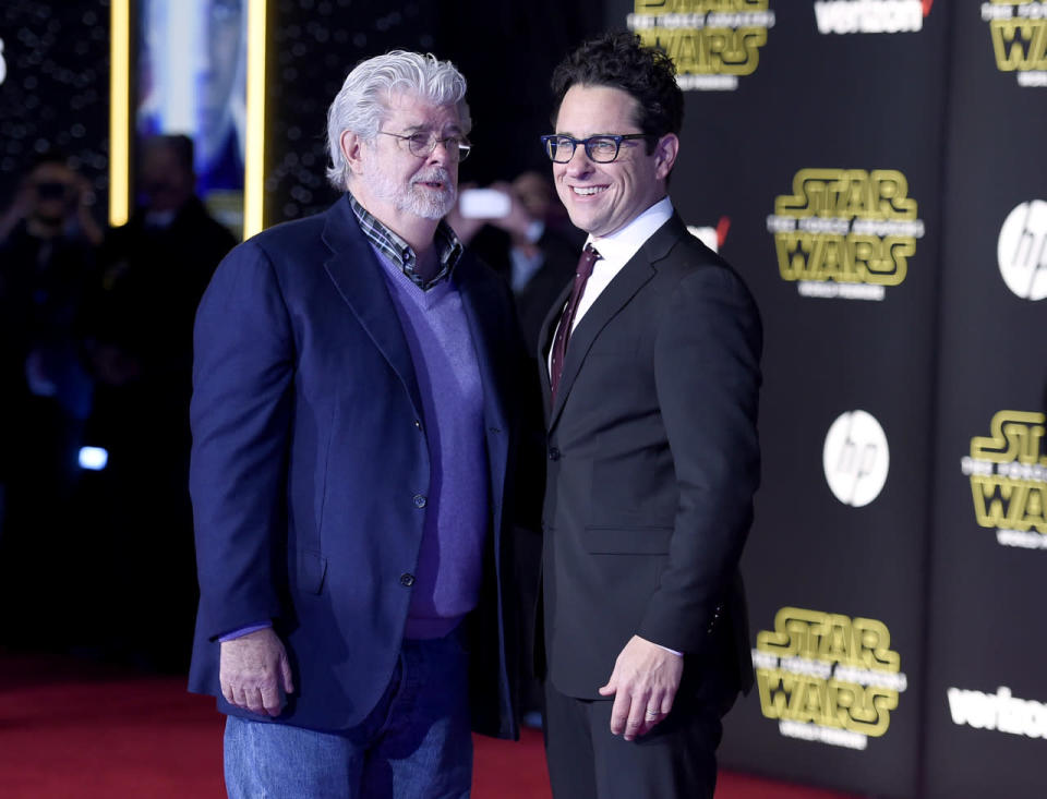 <p>George Lucas and <i>Force Awakens</i> director J.J. Abrams posed together on the LA carpet on Dec. 14. (Photo by Jordan Strauss/Invision/AP) </p>