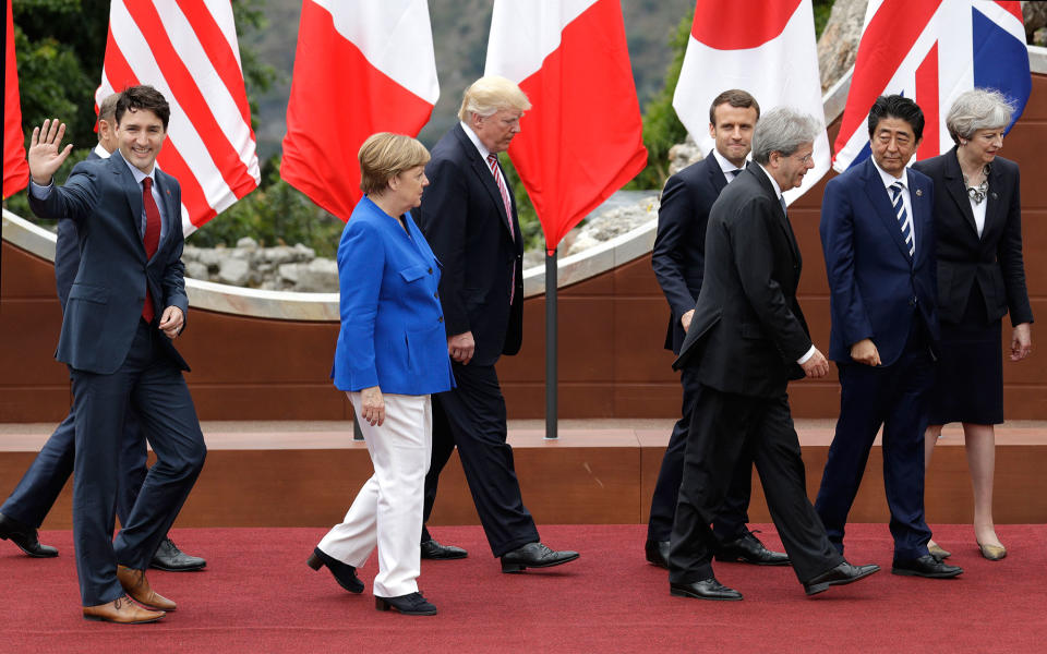 <p>G7 leaders from left, Canadian Prime Minister Justin Trudeau, German Chancellor Angela Merkel, U.S. President Donald Trump, French President Emmanuel Macron, Italian Prime Minister Paolo Gentiloni, Japanese Prime Minister Shinzo Abe and British Prime Minister Theresa May leave the podium after a group photo at the G7 Summit in the Ancient Theater of Taormina ( 3rd century BC) in the Sicilian citadel of Taormina, Italy, Friday, May 26, 2017. (Photo: Andrew Medichini/AP) </p>