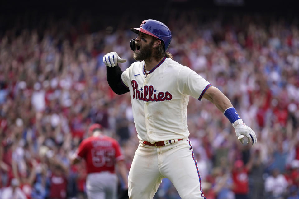 Philadelphia Phillies' Bryce Harper reacts after hitting a two-run home run against Los Angeles Angels pitcher Matt Moore during the eighth inning of a baseball game, Wednesday, Aug. 30, 2023, in Philadelphia. (AP Photo/Matt Slocum)