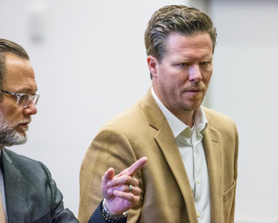 Paul Petersen appears in Maricopa County Superior Court, Thursday, Dec. 19, 2019 in Phoenix. Lynwood Jennet accused of helping Paul Petersen, a metro Phoenix politician in what authorities have called an illegal adoption scheme involving women from the Marshall Islands pleaded guilty Thursday to helping arrange benefits from Arizona's Medicaid program for expecting mothers even though the women didn't live in the state (Tom Tingle/The Arizona Republic via AP, Pool)