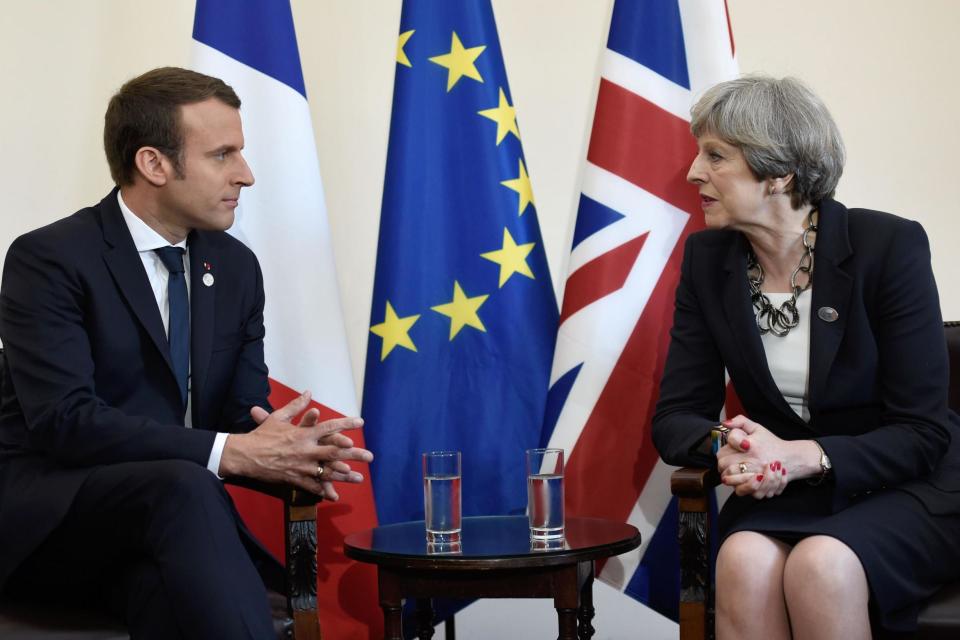 Talks: French President Emmanuel Macron and Theresa May during the G7 summit in Italy: AFP/Getty Images