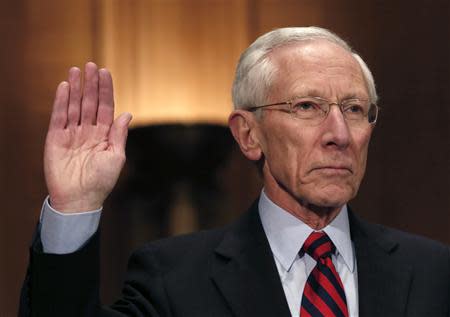 Stanley Fischer, the former chief of the Bank of Israel, is sworn before a Senate Banking Committee confirmation hearing on his nomination to be a member and vice chairman of the Federal Reserve Board of Governors on Capitol Hill in Washington, in this March 13, 2014 file photo. REUTERS/Yuri Gripas/Files