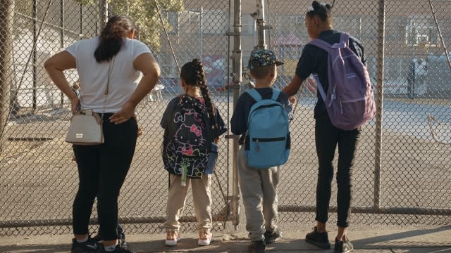 Migrant children getting ready for school