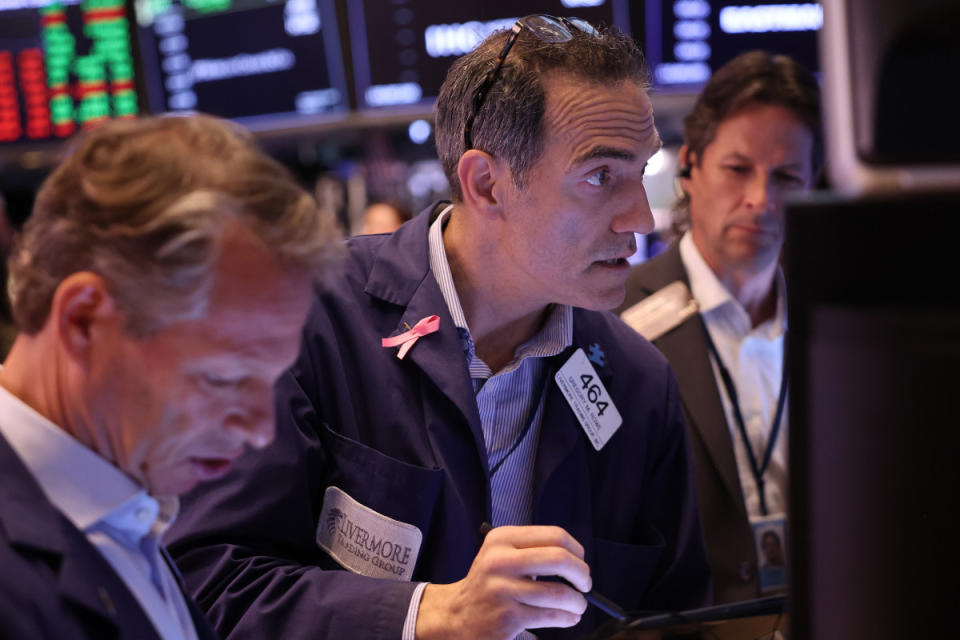 Traders work on the floor of the New York Stock Exchange in early September.<p>Michael M. Santiago/Getty Images</p>