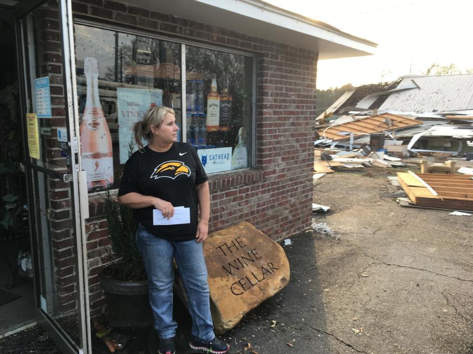 Liquor store owner Cynthia Holland says she’ll repair her liquor store in Petal, Mississippi, following a predawn tornado on Saturday, Jan., 21, 2017. Holland, though, says she’s worried about money and what her employees will do while the store is closed. . Petal Mayor Hal Marx says more than 300 homes and 30 businesses were damaged in his 10,000-resident city, along with hundreds more in its larger neighbor of Hattiesburg. The twister plowed a 25-mile path across south Mississippi, killing four people and injuring dozens. (AP Photo/Jeff Amy)