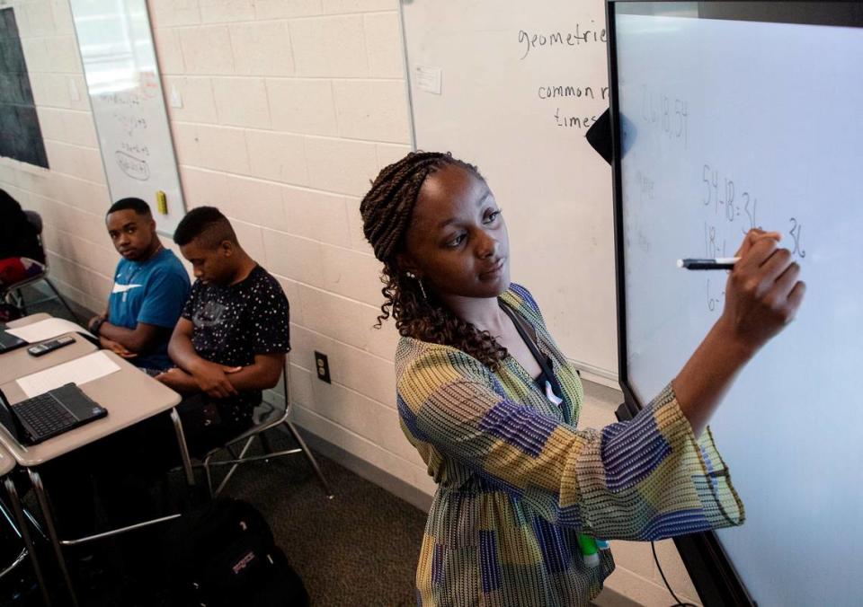 Students listen as Knightdale High School teacher Alex Johnson reviews examples of sequences during a math class on Tuesday, Sept. 5, 2023, in Knightdale, N.C.