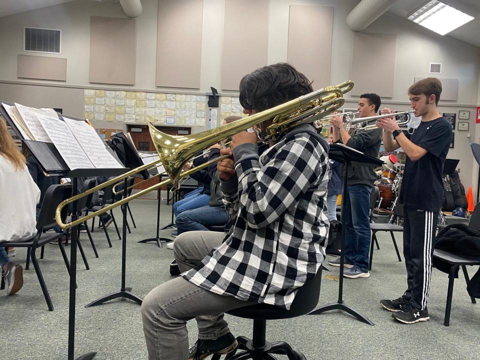 Members of the Foothill High School jazz band practice for Club Cougar on Monday.