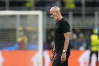 AC Milan's manager Stefano Pioli walks off the field at the end of the Champions League semifinal first leg soccer match between AC Milan and Inter Milan at the San Siro stadium in Milan, Italy, Wednesday, May 10, 2023. Inter Milan won 2-0. (AP Photo/Antonio Calanni)