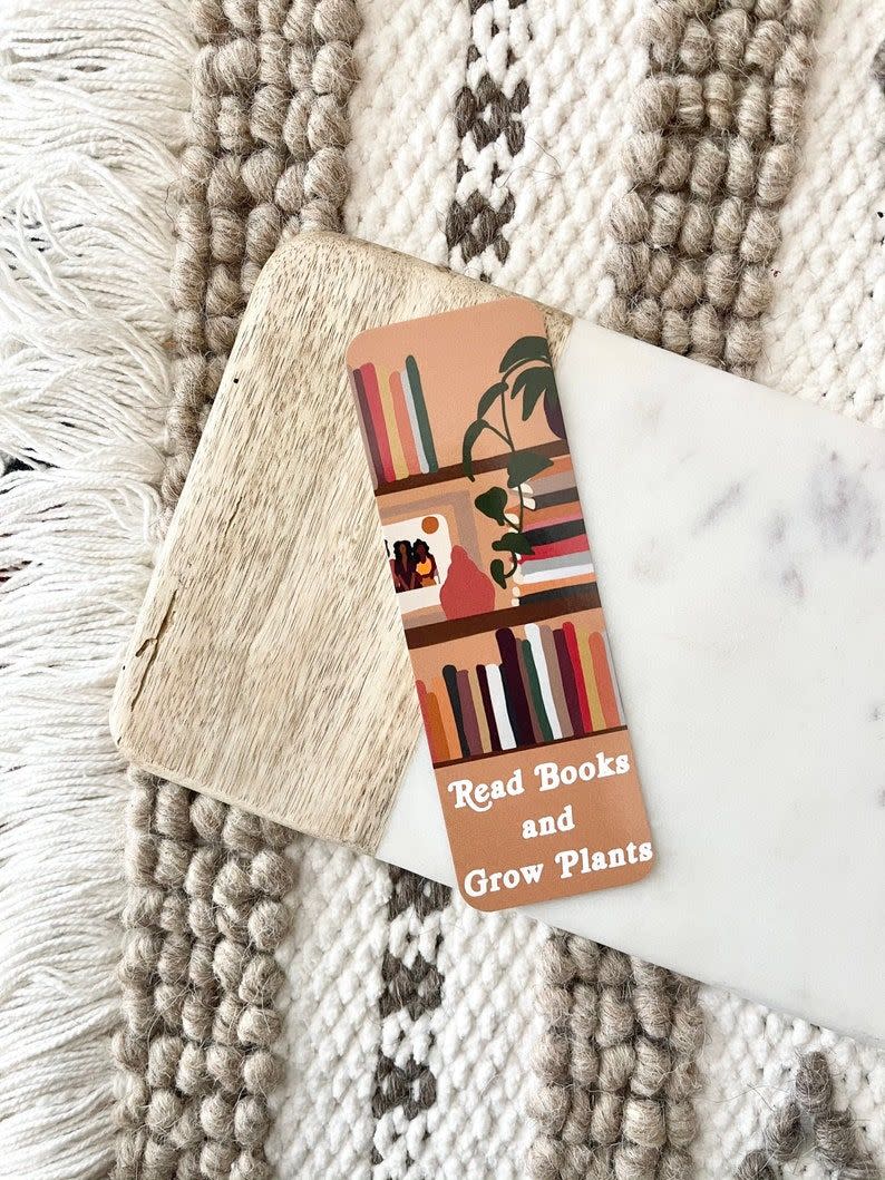 <p>etsy.com</p><p><strong>$3.99</strong></p><p>If they're a self-professed bookworm, chances are losing bookmarks is par for the course in their view. However, this graphic design is just too good to misplace. You can also gift them <a href="https://www.goodhousekeeping.com/life/entertainment/g32766962/best-books-by-black-authors/" rel="nofollow noopener" target="_blank" data-ylk="slk:a great book from a Black author;elm:context_link;itc:0;sec:content-canvas" class="link ">a great book from a Black author</a> to go with it. </p>