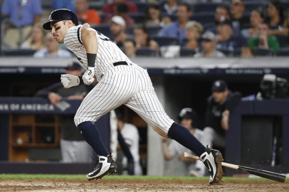 New York Yankees' Mike Tauchman watches his seventh-inning, two-run single in the second baseball game of the team's doubleheader against the Boston Red Sox, Saturday, Aug. 3, 2019, in New York. (AP Photo/Kathy Willens)