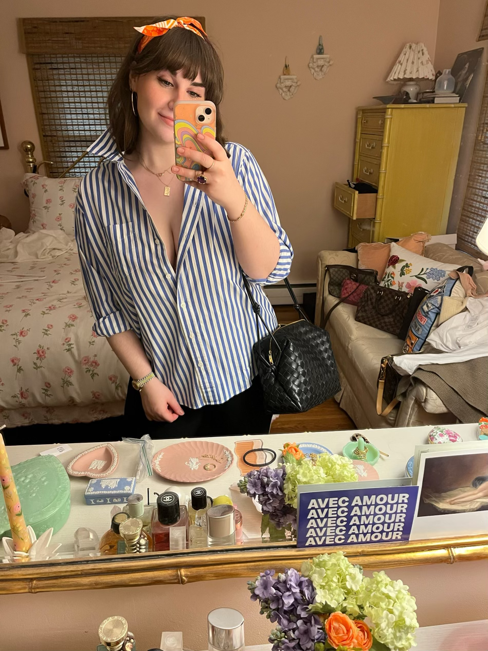 My uniform: stretchy black pants and an oversized button down