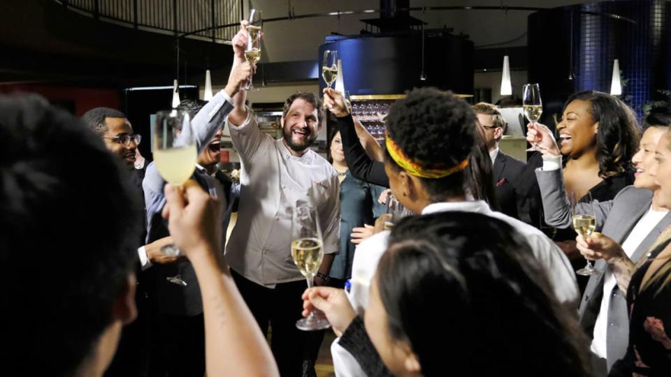 <div class="inline-image__caption"><p><em>Top Chef </em>winner and accused sexual harasser Gabe Erales leads a toast</p></div> <div class="inline-image__credit">Bravo</div>