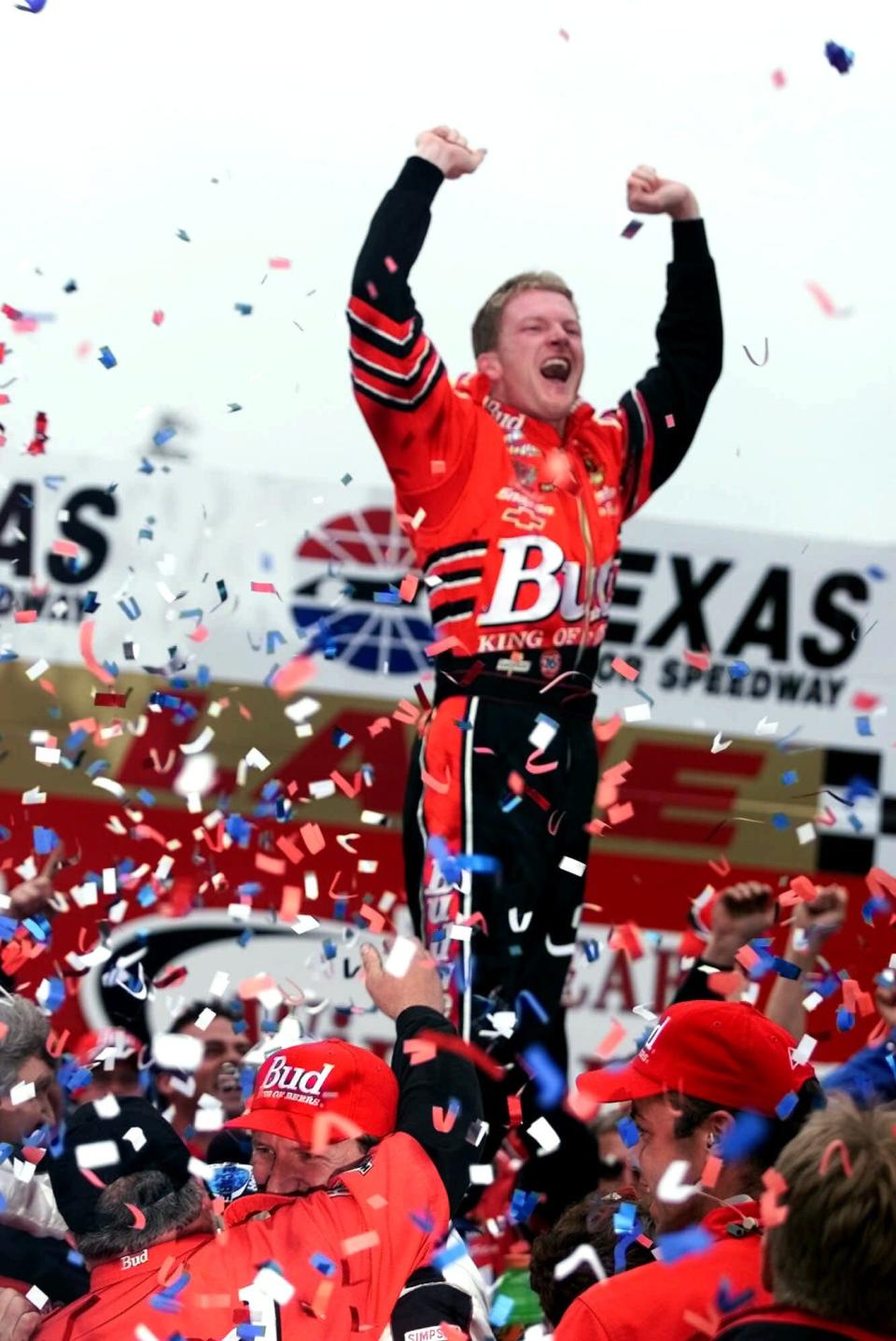 Dale Earnhardt Jr. celebrates his win in the DirectTV 500 at Texas Motor Speedway on April 2, 2000.