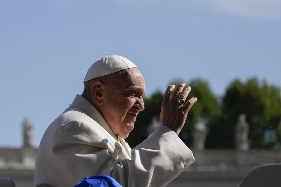 Pope Francis waves as he arrives for an audience with Azione Cattolica, Catholic Action pilgrims and faithful in St. Peter's Square, at the Vatican, Thursday, April 25, 2024. (AP Photo/Alessandra Tarantino)