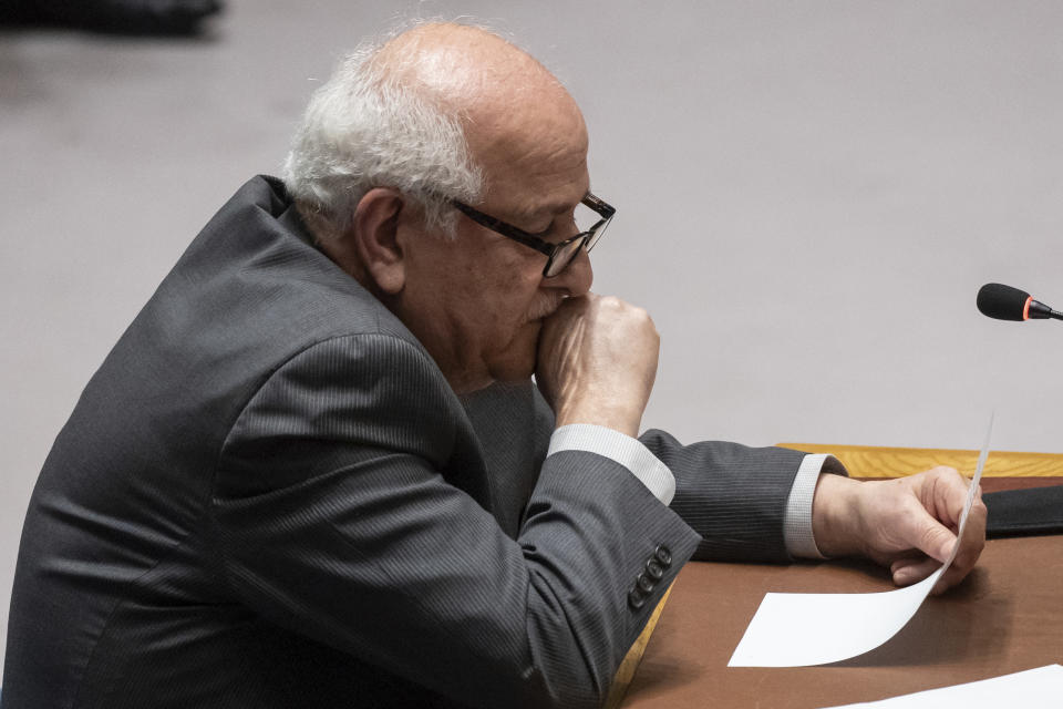 Palestinian Ambassador to the United Nations Riyad Mansour holds tears while speaking during a Security Council meeting at United Nations headquarters, Thursday, April 18, 2024. (AP Photo/Yuki Iwamura)