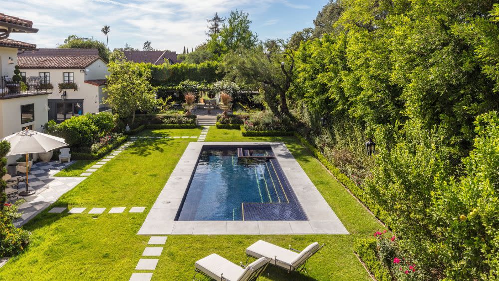 The swimming pool is covered in hand-laid mosaic tile - Credit: Tyler Hogan