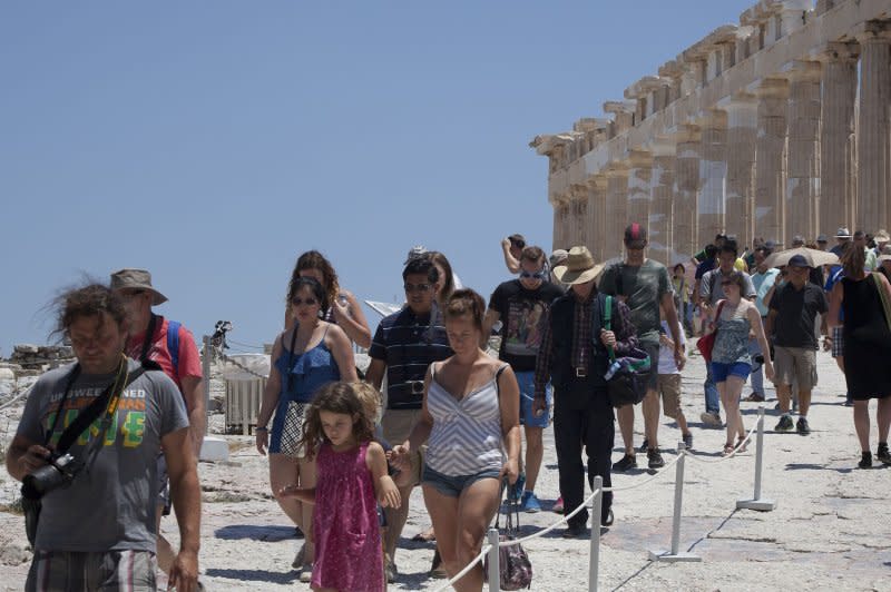 Tourists visit the Parthenon at the Athens' Acropolis archaeological site in Athens, Greece. On Monday, the country started limiting the number of visitors to the ancient landmark to preserve the ruins and to prevent overcrowding. File photo by Dimitris Michalakis/UPI