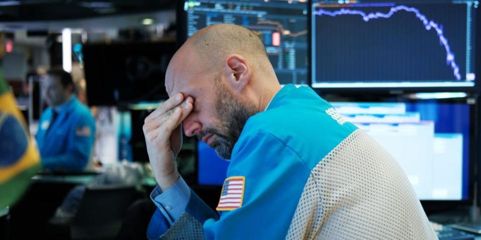 Traders work on the floor of the New York Stock Exchange (NYSE) on March 18, 202