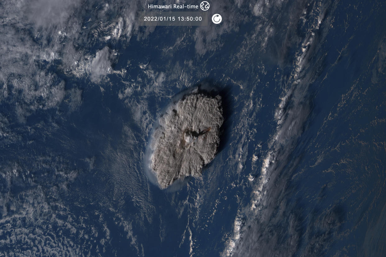 This satellite image taken by Himawari-8, a Japanese weather satellite operated by Japan Meteorological Agency and released by National Institute of Information and Communications Technology (NICT), shows an undersea volcano eruption at the Pacific nation of Tonga Saturday, Jan. 15, 2022. (NICT via AP)