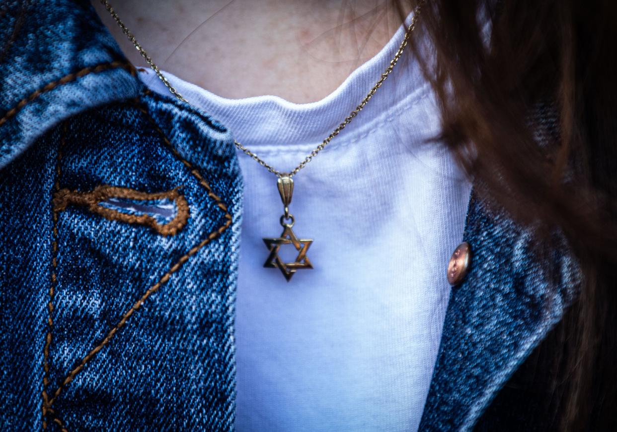 Miranda Price, 21, a Cornell University senior from New City, N.Y. continues to wear her Star of David necklace despite the threats made against Jews by a fellow student. She feels that since the war between Israel and Hamas began, there are two groups of people that are hurting in different ways. Price, photographed on campus Nov. 6, 2023, says she tries to understand the perspective of pro-Palestinian students on campus, but doesnÕt alway feel that the perspective of those supporting Israel is taken into consideration.