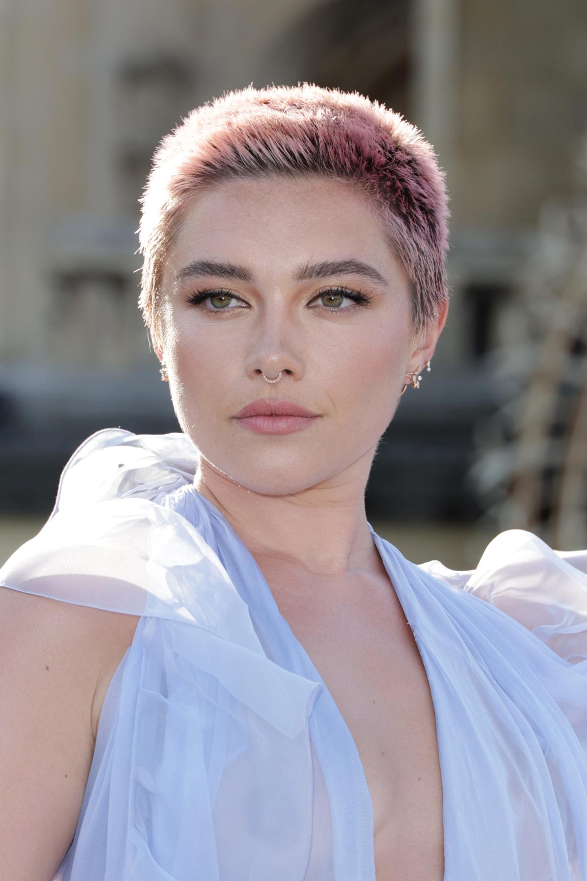 Florence Pugh bares it all again at Paris Fashion Week in sheer gown ...