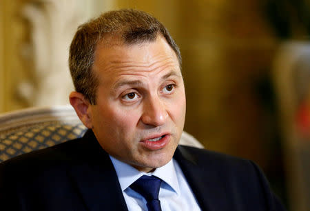 FILE PHOTO: Lebanese Foreign Minister Gebran Bassil speaks during an interview with Reuters at the Egmont Palace in Brussels, Belgium May 14, 2018. REUTERS/Francois Lenoir/File Photo