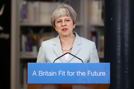 Britain's Prime Minister Theresa May delivers a speech to students and staff during her visit to Derby College in Derby, Britain, February 19, 2018. REUTERS/Christopher Furlong/Pool