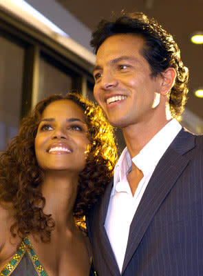 Halle Berry and Benjamin Bratt at the Hollywood premiere of Warner Brothers' Catwoman