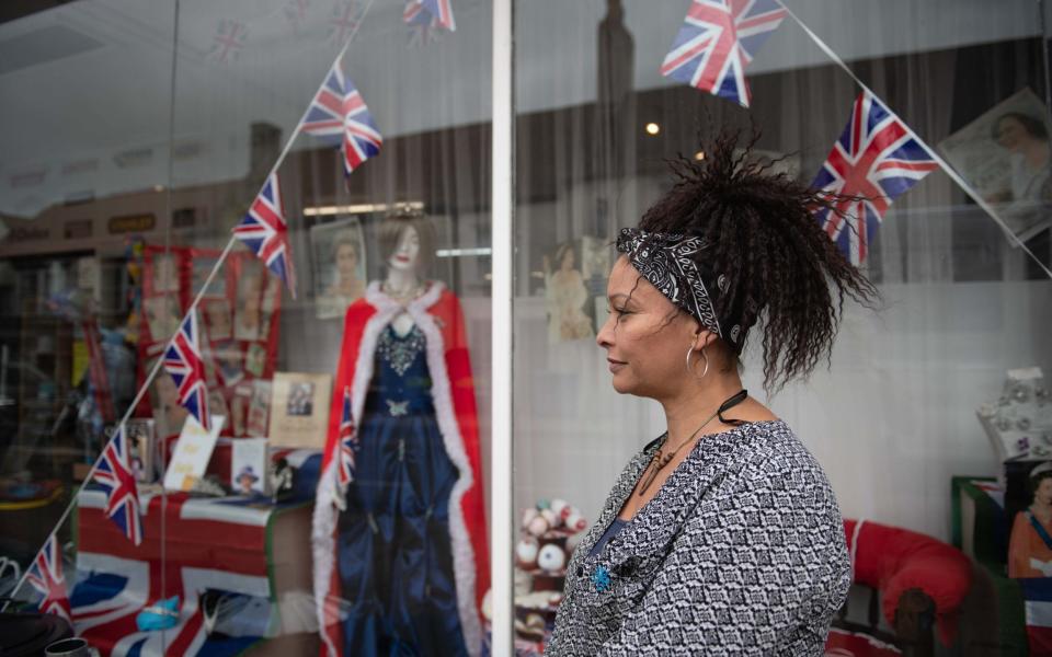 Christine Stone, owner of Hawkins of Thornbury, stands outside her shop