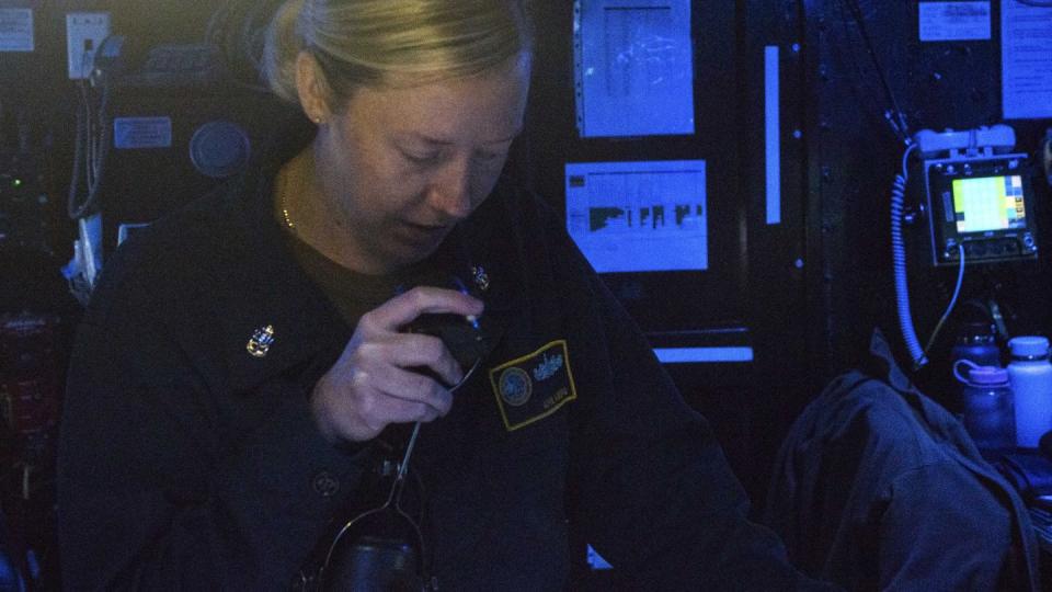 Chief Operations Specialist April Koberg stands watch in the combat information center aboard the command and control ship Mount Whitney Aug. 17 in the Aegean Sea during Large Scale Exercise. (MC2 Mario Coto/Navy)